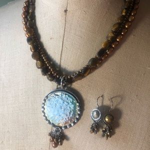 Silpada Sterling Silver, brass, and brown pearl + tiger eye ensemble.